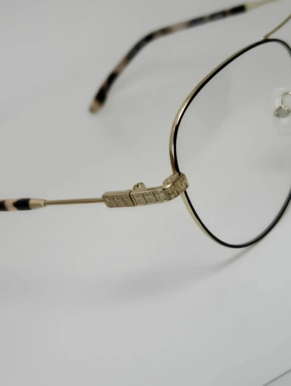 BCBGMAXAZRIA Call Aviator Eyeglass Frames in Black and Gold. Feminine.